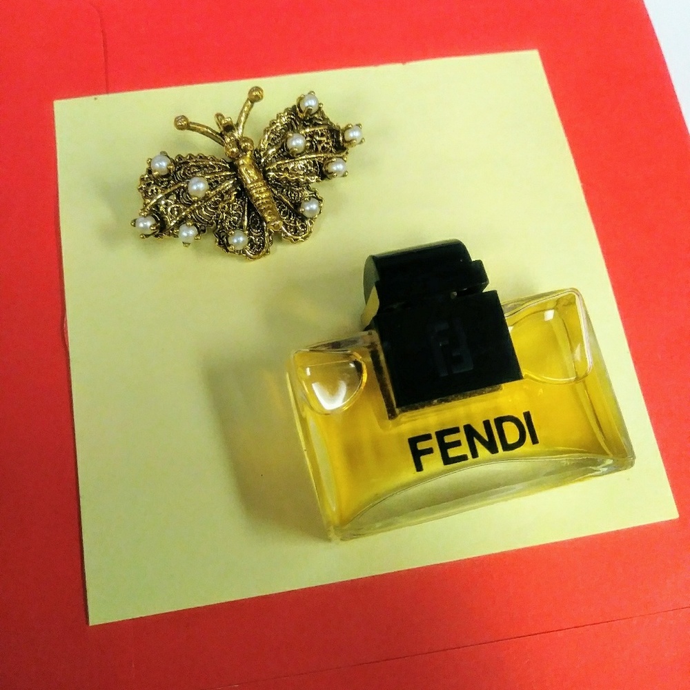 One of a kind 14k gold with mini pearls butterfly